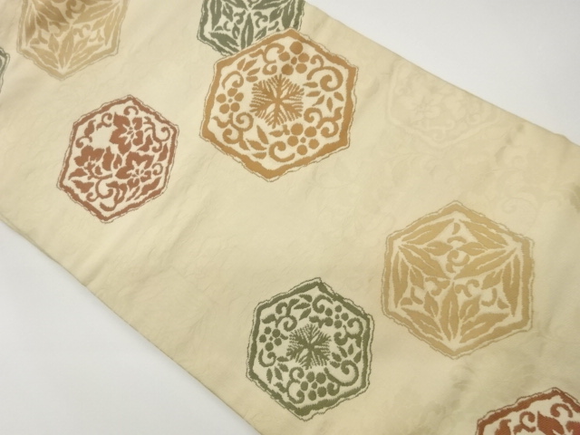 Nagoya obi woven with tortoiseshell, flower arabesque, and leaf patterns